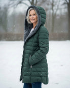 Dark green Lumina Wear fleece-lined puffer jacket, elegant fit, lightweight winter coat with a flattering silhouette.