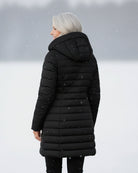 Dark green Lumina Wear Grace fleece-lined puffer jacket with a flattering fit, shown on a model in a full front view.