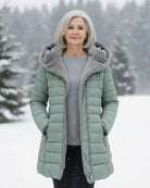 Dark green Lumina Wear Grace fleece-lined puffer jacket with a flattering fit, showcasing its stylish and cozy winter design.