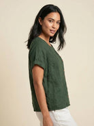 Army green Lumina Wear Grace relaxed linen blouse with button detail, featuring a casual fit and lightweight fabric.
