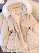Beige Hailey Lumina Wear utility parka jacket with cozy faux-fur trim, front pockets, and hood, perfect for winter warmth.