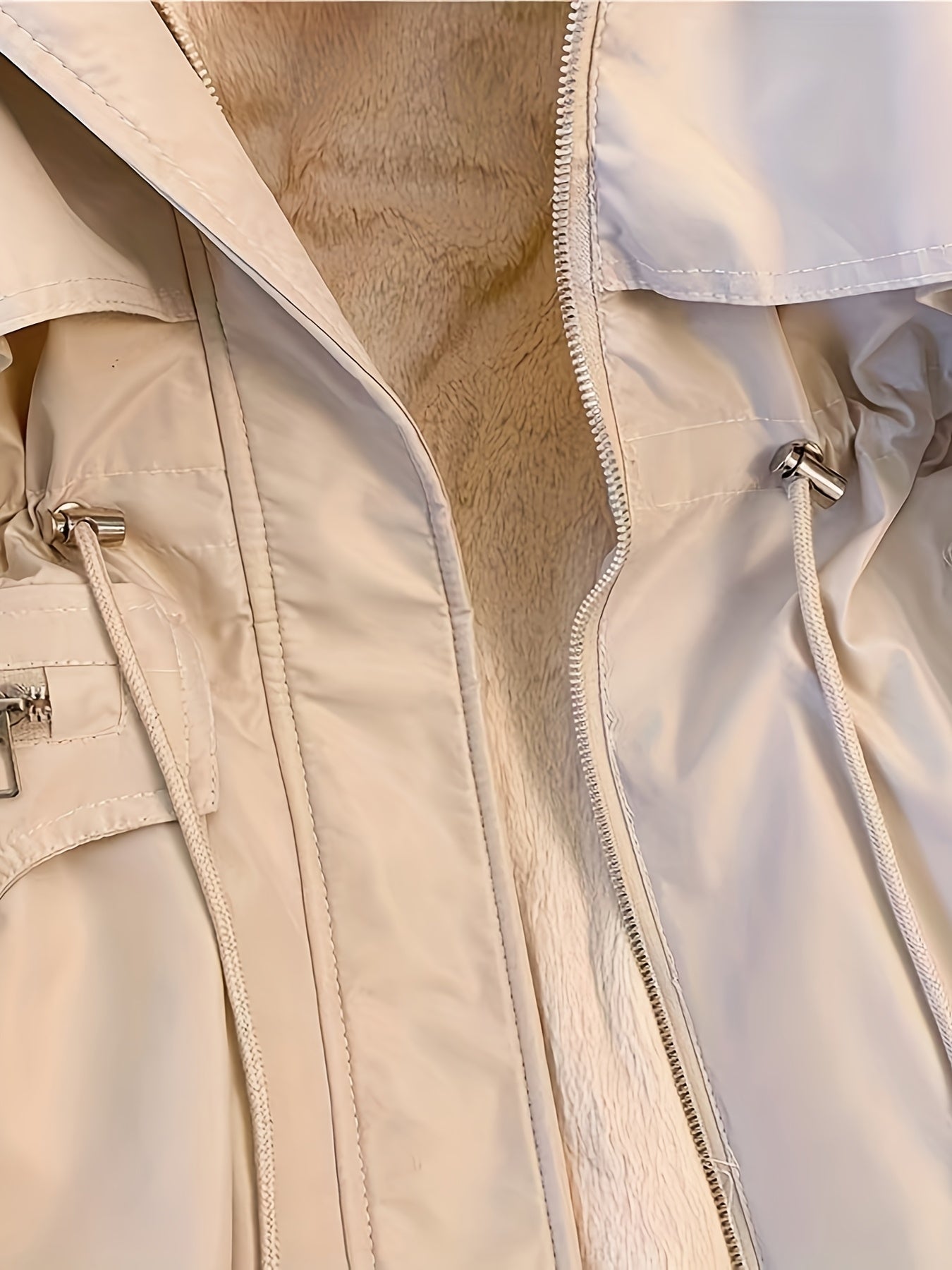 Beige Hailey Lumina Wear utility parka jacket with cozy faux-fur trim, featuring a practical design and warm winter style.
