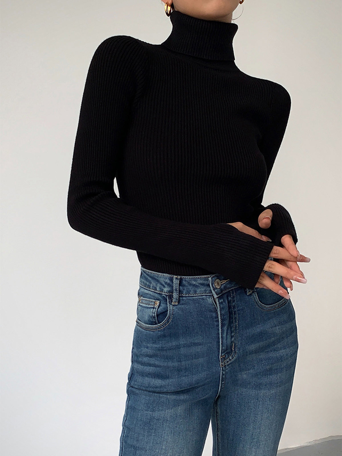 Dark brown Lumina Wear Hailey minimalist turtleneck top, showcasing a sleek winter-ready design with a close-up of the fabric and fit.