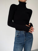Dark brown Lumina Wear Hailey minimalist turtleneck sweater for winter, featuring a sleek, fitted design and cozy fabric.