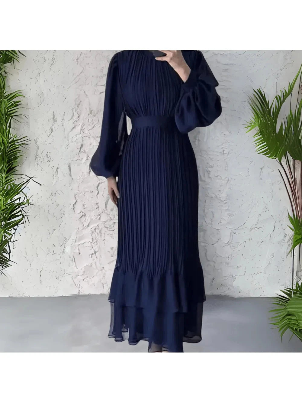 Blue Hannah™ pleated elegant dress by Lumina Vancouver, featuring a sophisticated design and flowing fabric.