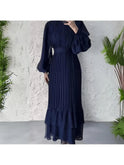 Blue Hannah pleated elegant dress by Lumina Wear, stylish and flowing with a sophisticated design perfect for formal occasions.