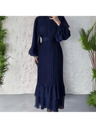 Blue Hannah™ pleated elegant dress by Lumina Vancouver, featuring a sophisticated design and flowing fabric.