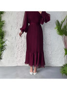 Blue Hannah™ pleated elegant dress by Lumina Vancouver, featuring flowy fabric and stylish design, perfect for formal occasions.