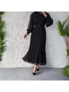 Blue Hannah™ pleated elegant dress by Lumina Vancouver, showcasing a flowing, stylish design perfect for formal occasions.