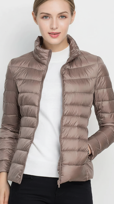 Harriet Lumina Wear lightweight black puffer jacket with stand collar, shown in matcha color, XS size, stylish winter outerwear.