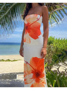 Bright orange Hawin bandeau summer dress by Lumina Vancouver, perfect for holiday vibes and warm-weather outings.