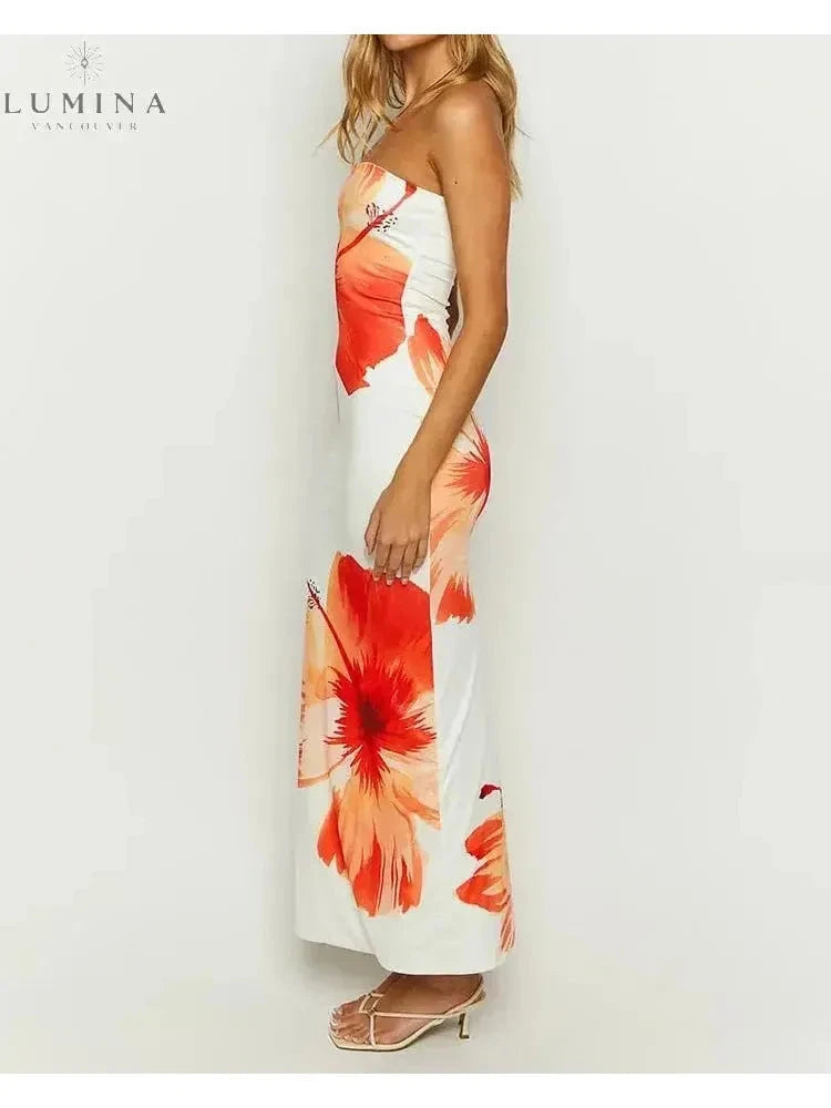 Orange Hawin bandeau summer dress by Lumina Vancouver, perfect for holiday vibes, featuring a stylish, sleeveless design for warm weather.