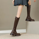 Elegant black knee-high boots for women with orthopedic support by Lumina Wear, featuring a cozy fur lining.