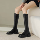 Elegant black knee-high boots for women with orthopedic support by Lumina Wear, featuring a cozy fur lining.