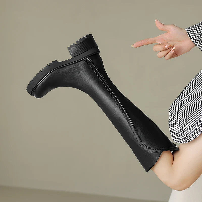 Elegant black knee-high boots for women by Lumina Wear featuring orthopedic support and brown fur detail.