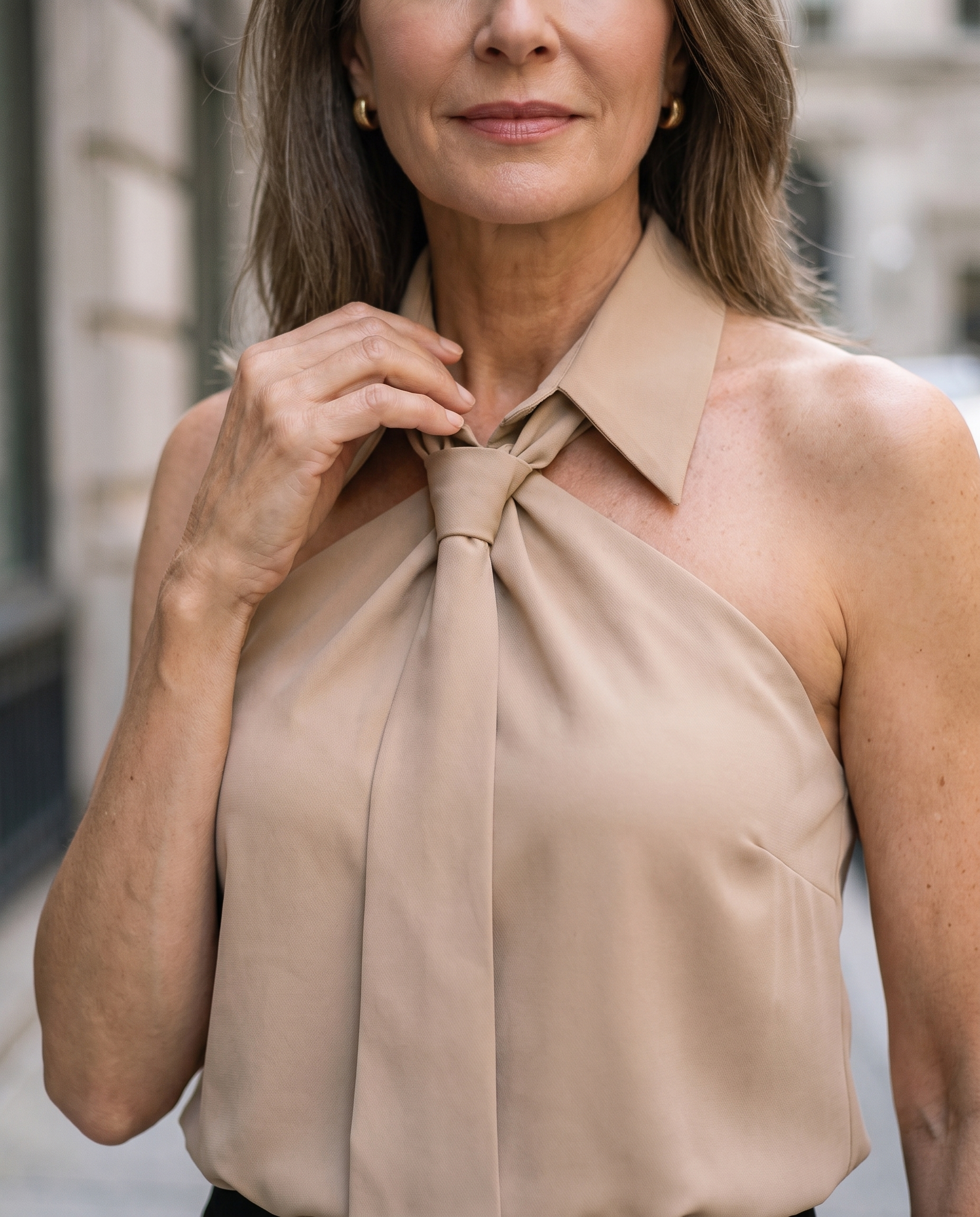 Lumina Wear Luna sleeveless halter blouse with neck tie, featuring a stylish and elegant design perfect for casual or dressy occasions.