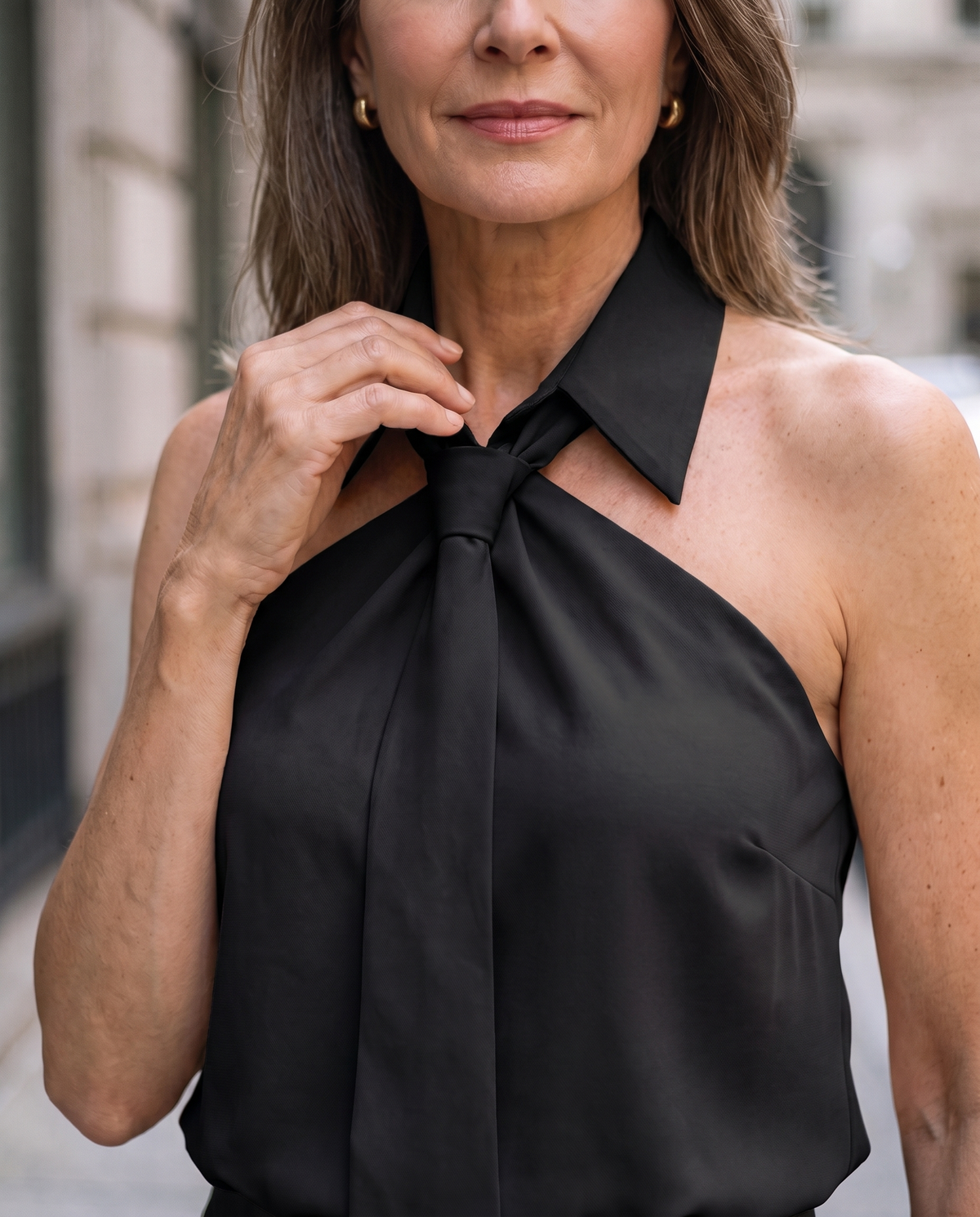 Lumina Wear Luna sleeveless halter blouse with neck tie, showcased in a stylish, lightweight design on a neutral background.