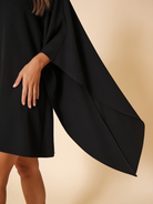 Lumina Wear Eclipse Nightfall one-shoulder draped mini dress in a sleek dark finish