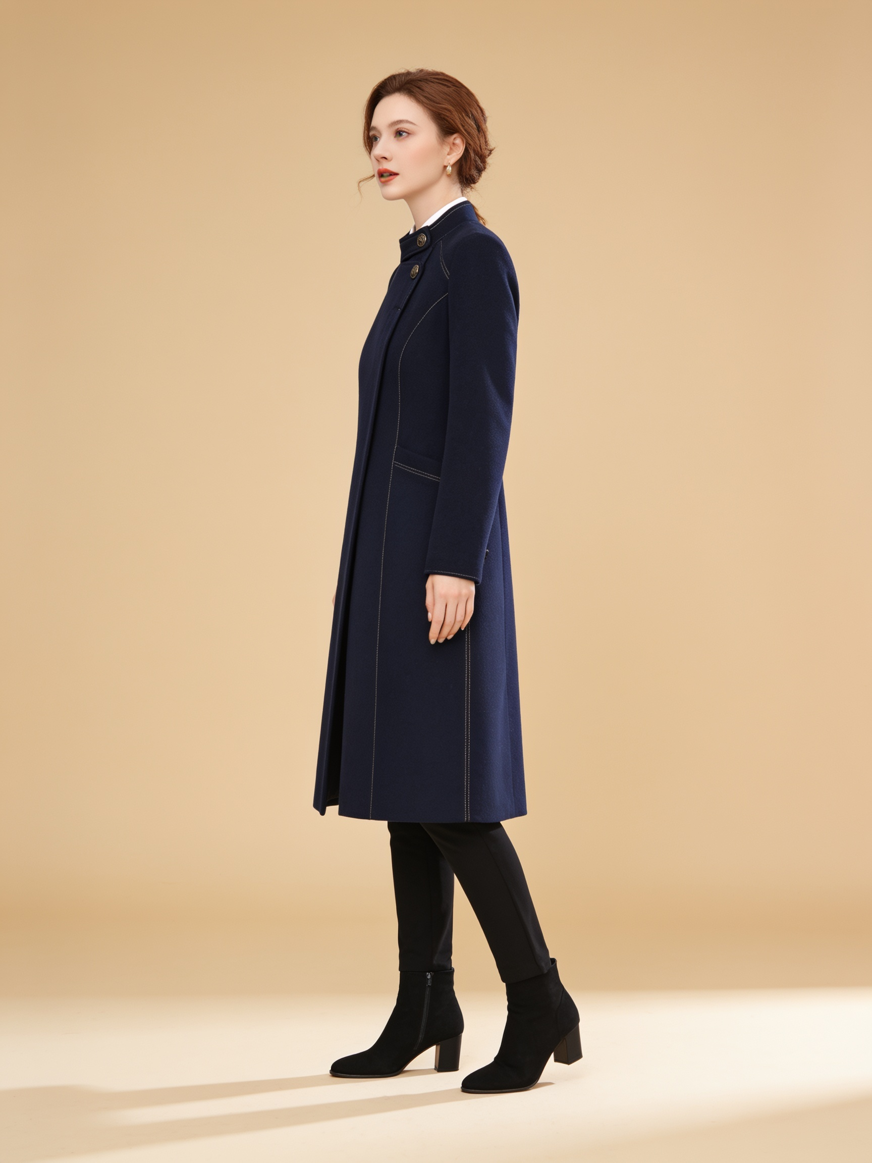 Lumina Wear Sophia button maxi coat in a long silhouette.