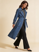 Lumina Wear Elena longline denim trench coat with belt in blue.