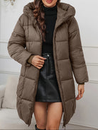 Redish-brown Holly longline hooded puffer coat by Lumina Wear, stylish minimalist design with cozy, insulated features.