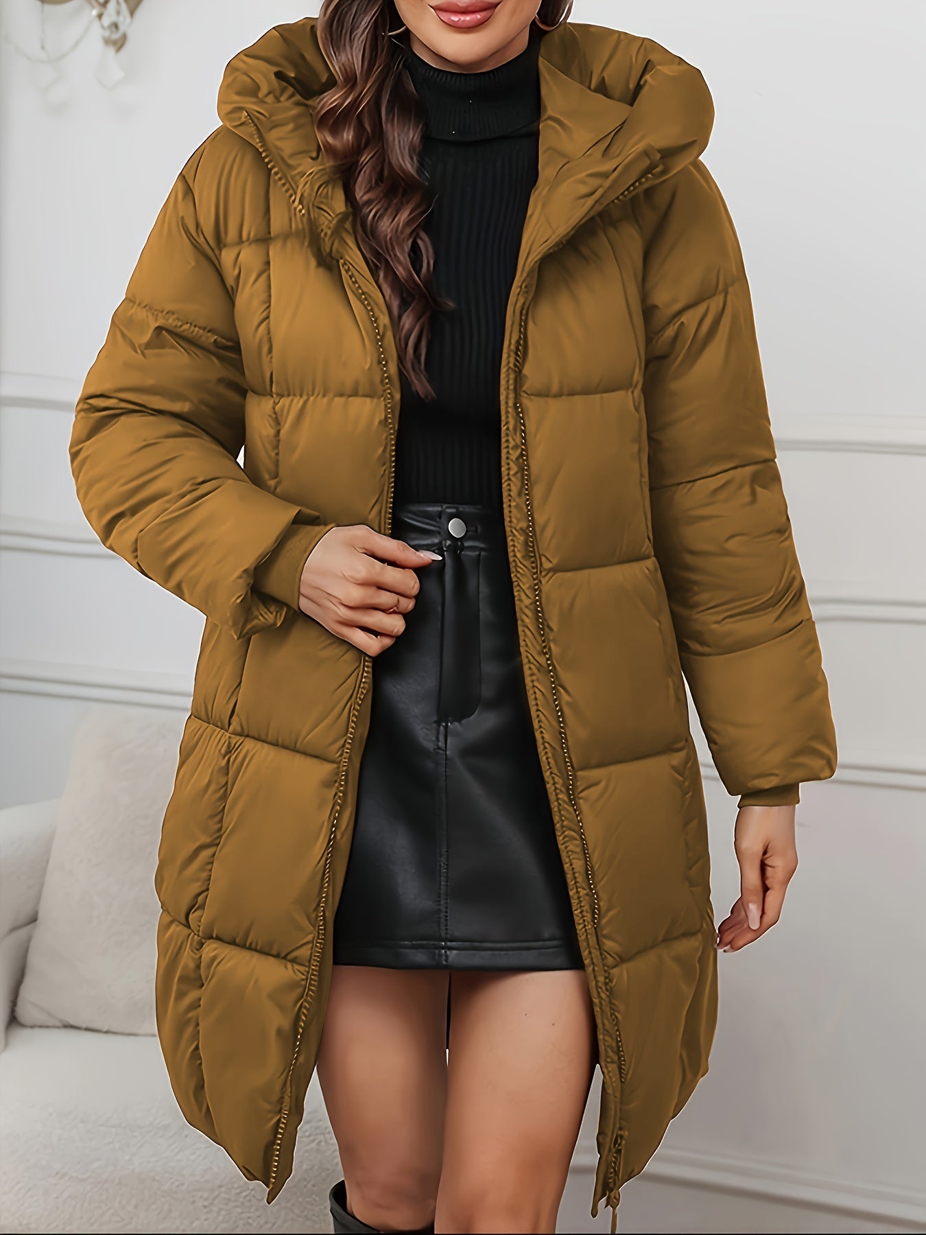 Redish-brown Holly longline hooded puffer coat by Lumina Wear featuring a minimalist design and cozy, insulated puffer style.