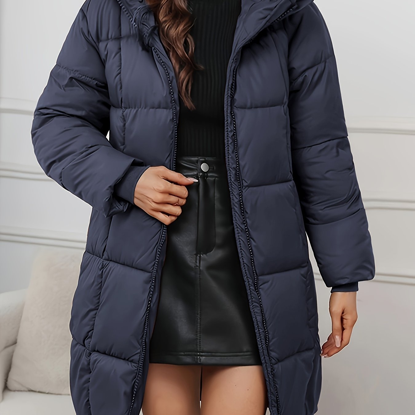 Redish-brown Holly longline hooded puffer coat by Lumina Wear, featuring a minimalist design and cozy, insulated puffer style.