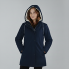 Yellow Lumina Wear Imogen Sherpa-lined hooded parka jacket for winter adventures, showing winter-ready design and cozy interior.