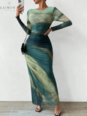 Dark blue Inara Dream Maxi Dress by Lumina Wear, elegant evening dress with flowing fabric, suitable for wedding guests.