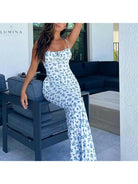 Isabeau Maxi Dress by Lumina Vancouver with holiday-inspired design, flowing fabric, and vibrant pattern perfect for festive occasions.