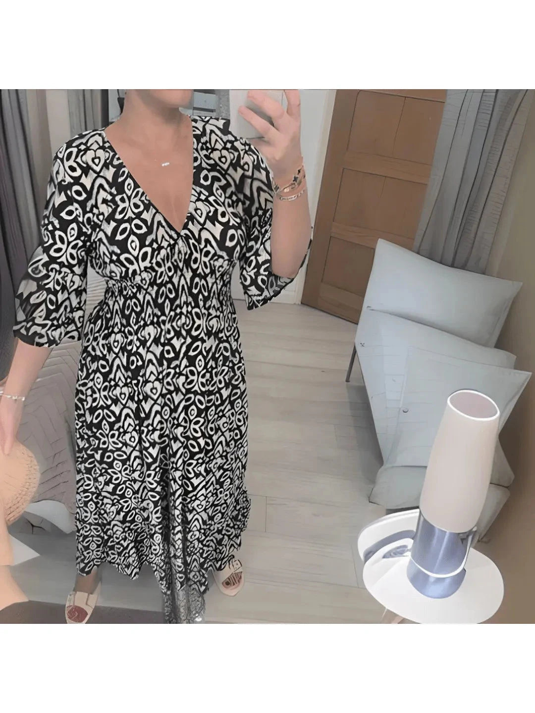 Red boho printed dress by Lumina Vancouver featuring a flowy silhouette and intricate patterns, perfect for casual or summer wear.