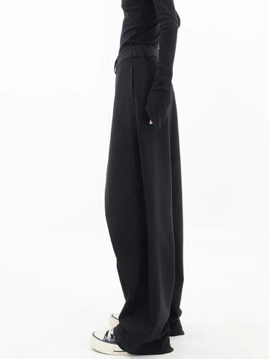 Black Isabella Lumina Wear chic asymmetric wide-leg trousers with a stylish, flowing fit and modern design.