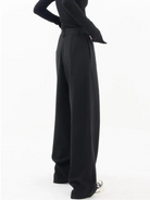 Black Isabella Chic Asymmetric Wide Leg Trousers by Lumina Wear, stylish and flowy with a modern asymmetric design.