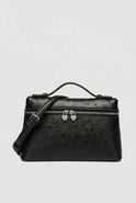 Black Lumina Wear Isabella crossbody handbag with adjustable strap, stylish and compact for everyday use.