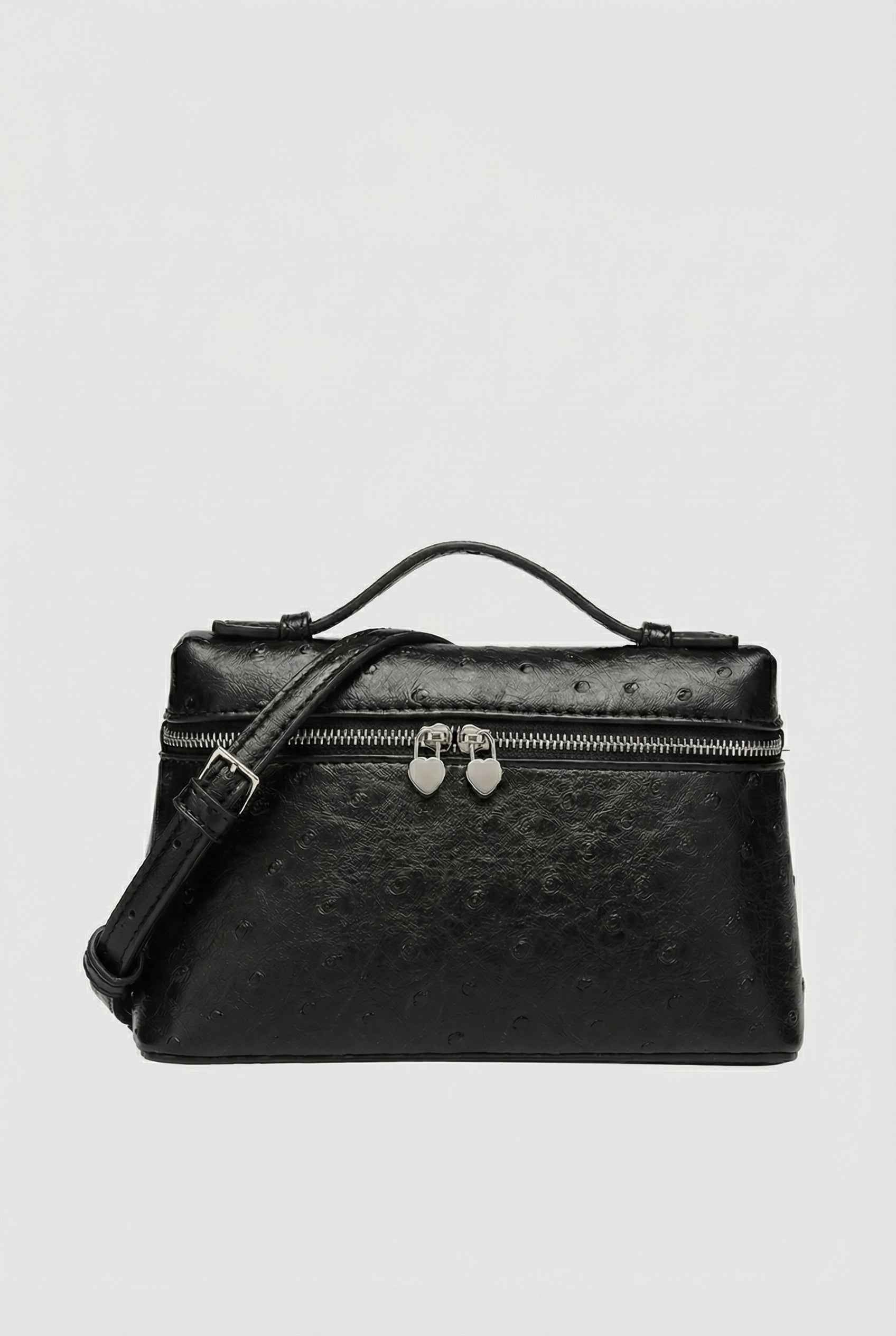 Lumina Wear Isabella black crossbody bag with adjustable strap, stylish and compact handbag for everyday use.