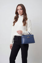 Lumina Wear Isabella chic black crossbody bag with adjustable strap, stylish handbag for everyday use.