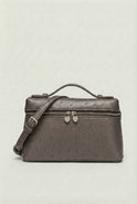 Lumina Wear Isabella black crossbody handbag with adjustable strap, stylish and compact for everyday use.