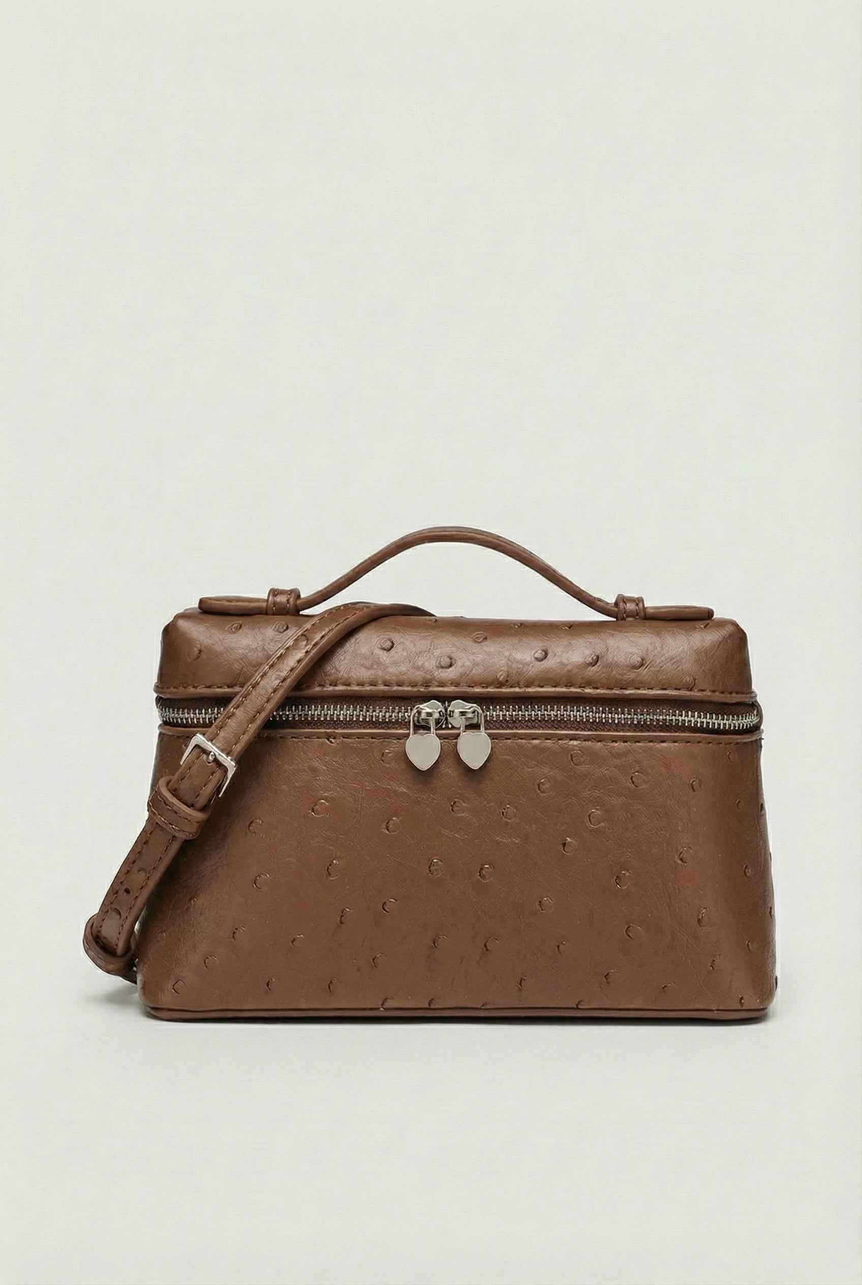 Lumina Wear Isabella black crossbody handbag with adjustable strap, stylish and compact for everyday use.