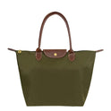 Isabella Lumina black faux leather handbag with spacious interior and chic design, featuring sturdy handles and sleek finish.