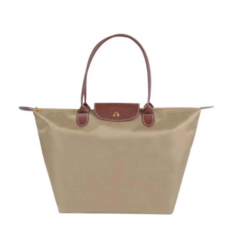 Black faux leather Isabella handbag by Lumina Wear featuring a spacious design and stylish look.