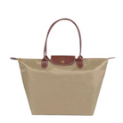 Black faux leather Isabella handbag by Lumina Wear featuring a spacious design and stylish look.
