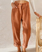 Isabella Lumina brown corduroy trousers with a flattering fit, shown on a model, highlighting the stylish design and texture.