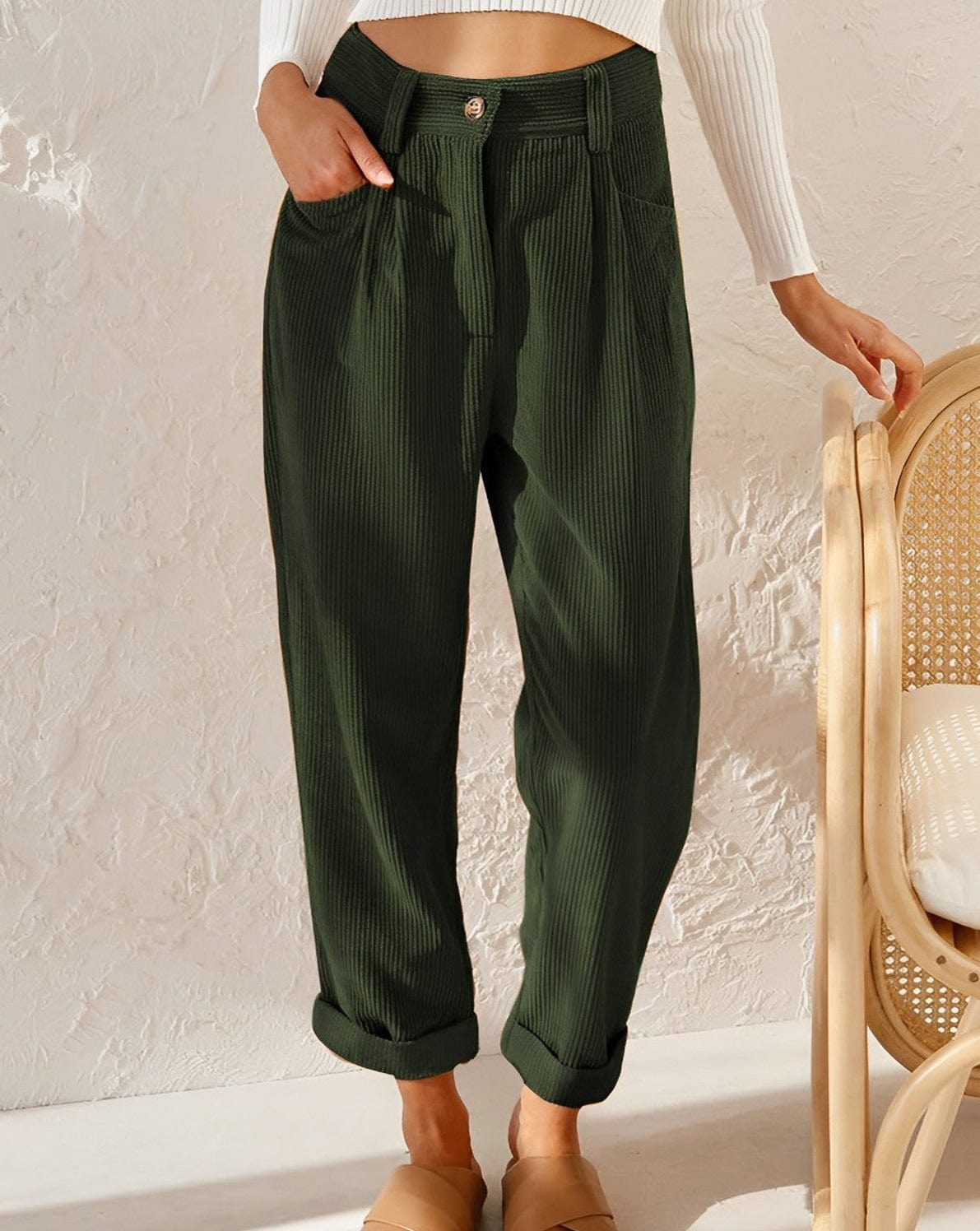 Isabella Lumina Wear brown corduroy trousers with a flattering fit, shown on a model featuring stylish, slim-cut design.