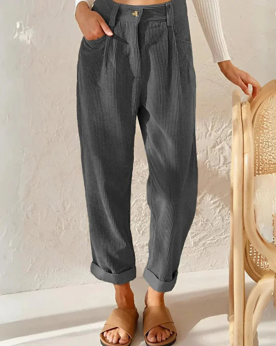 Isabella Lumina Wear chic brown corduroy trousers with a flattering fit, shown on a model with a casual pose.