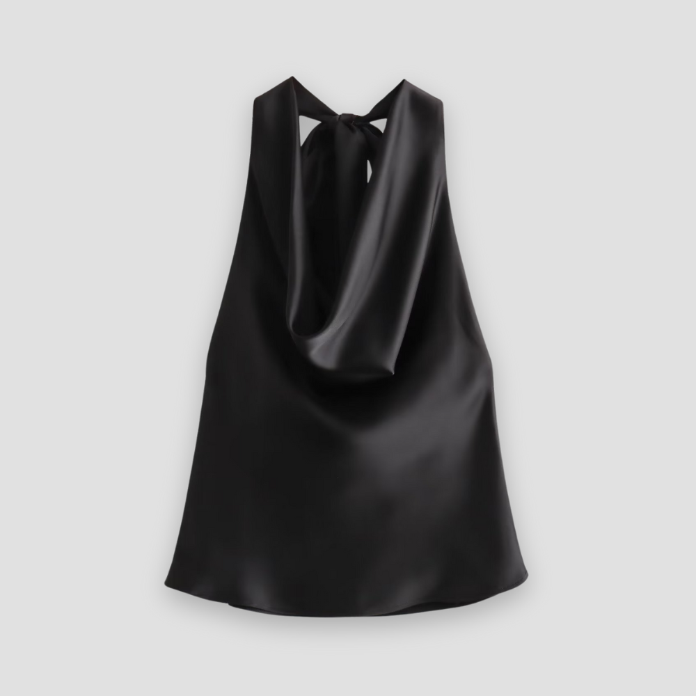 Brown Isabella Lumina Wear satin tank top with draped design and halter tie, shown on a model.