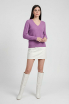 Dark purple Lumina Wear Isabella sweater with a cozy fit, featuring a flattering silhouette and soft knit texture.