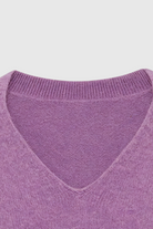 Dark purple Lumina Wear Isabella cozy sweater with a flattering fit, displayed on a plain background.