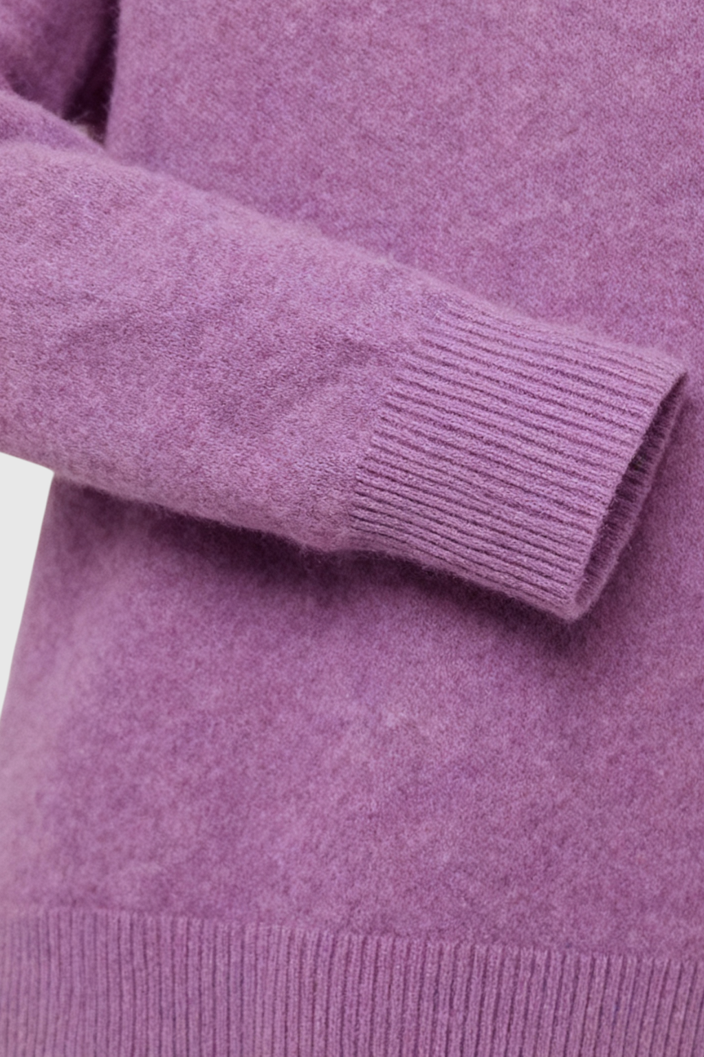 Dark purple Lumina Wear Isabella cozy sweater with a flattering fit, shown on a model. Soft knit fabric with a stylish, comfortable design.