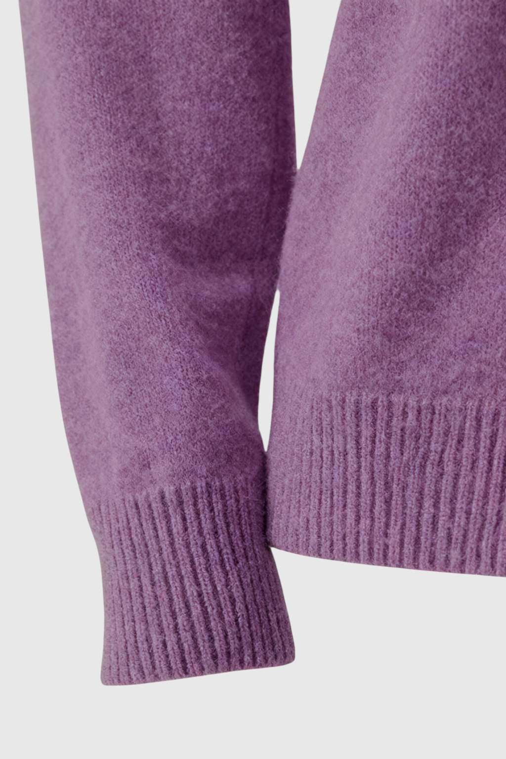 Dark purple Lumina Wear Isabella sweater with a cozy fit, featuring a flattering silhouette and soft knit fabric.