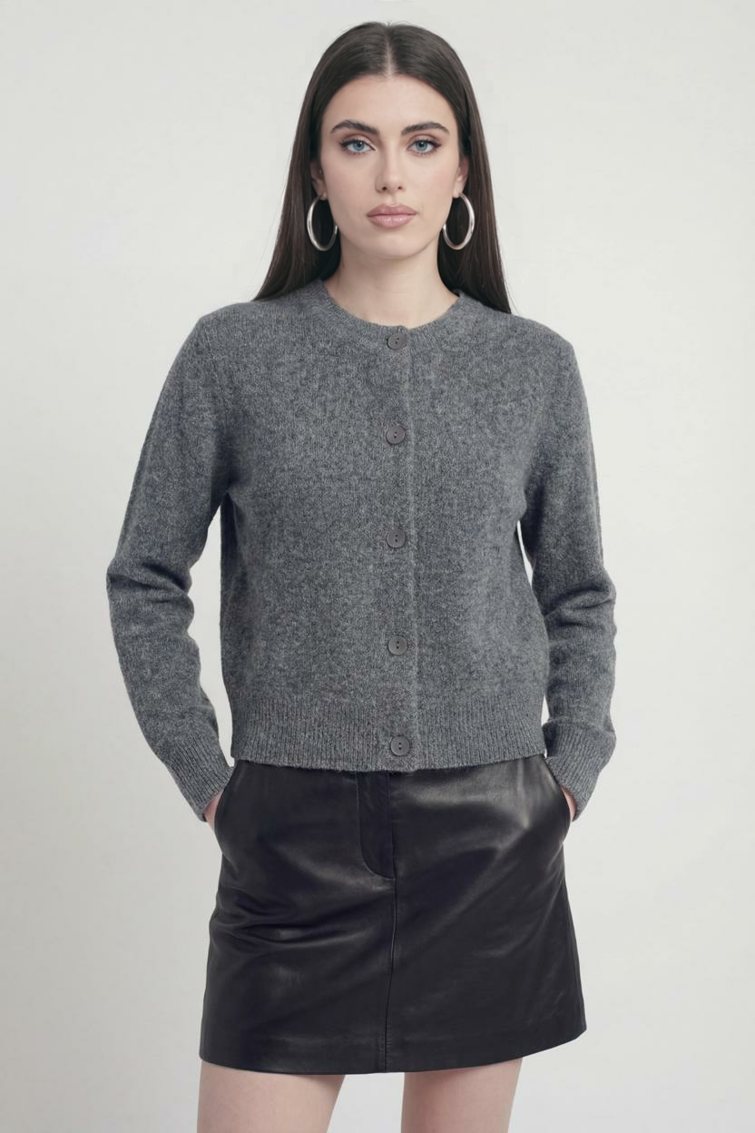 Gray long cardigan sweater by Lumina Wear, relaxed fit, cozy knit, styled casually with front pockets and open front design.